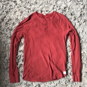 Red long sleeve Lucky Brand shirt.